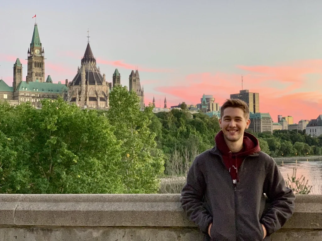 Sean Floyd with the Parliament of Canada in the background